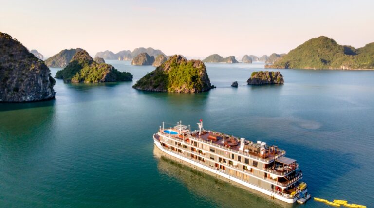 Cruise ship among limestone karsts in the Ha Long Bay area