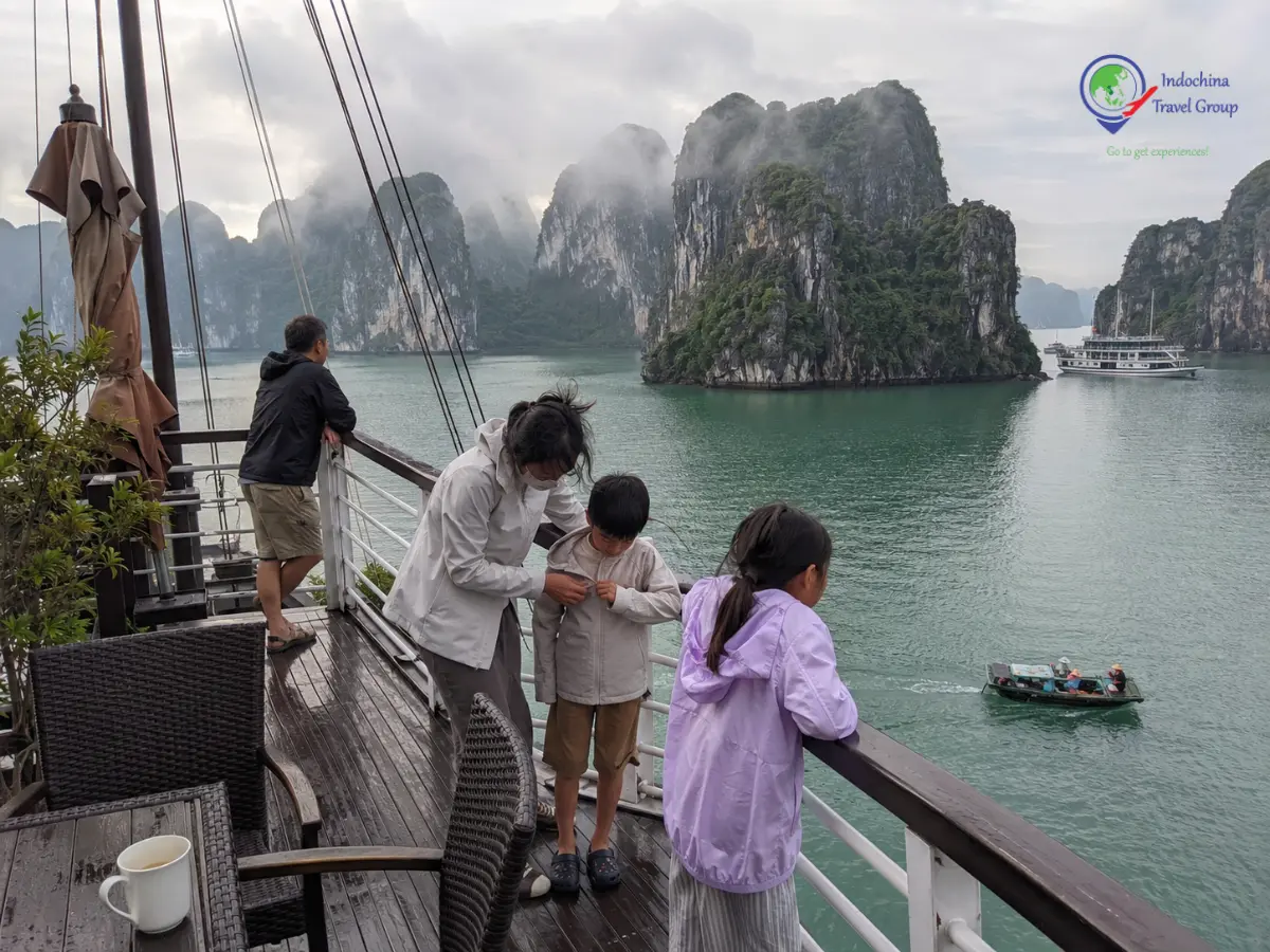 Filipino family enjoying a Halong Bay cruise in Vietnam
